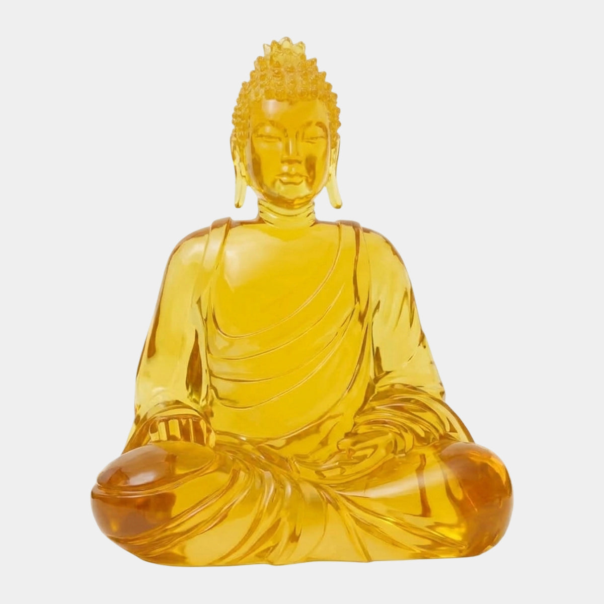 Amber Seated Buddha Cast Resin Sculpture, 114cm, translucent amber figure with lowered eyes and robe draped over one shoulder, set against a plain white background.