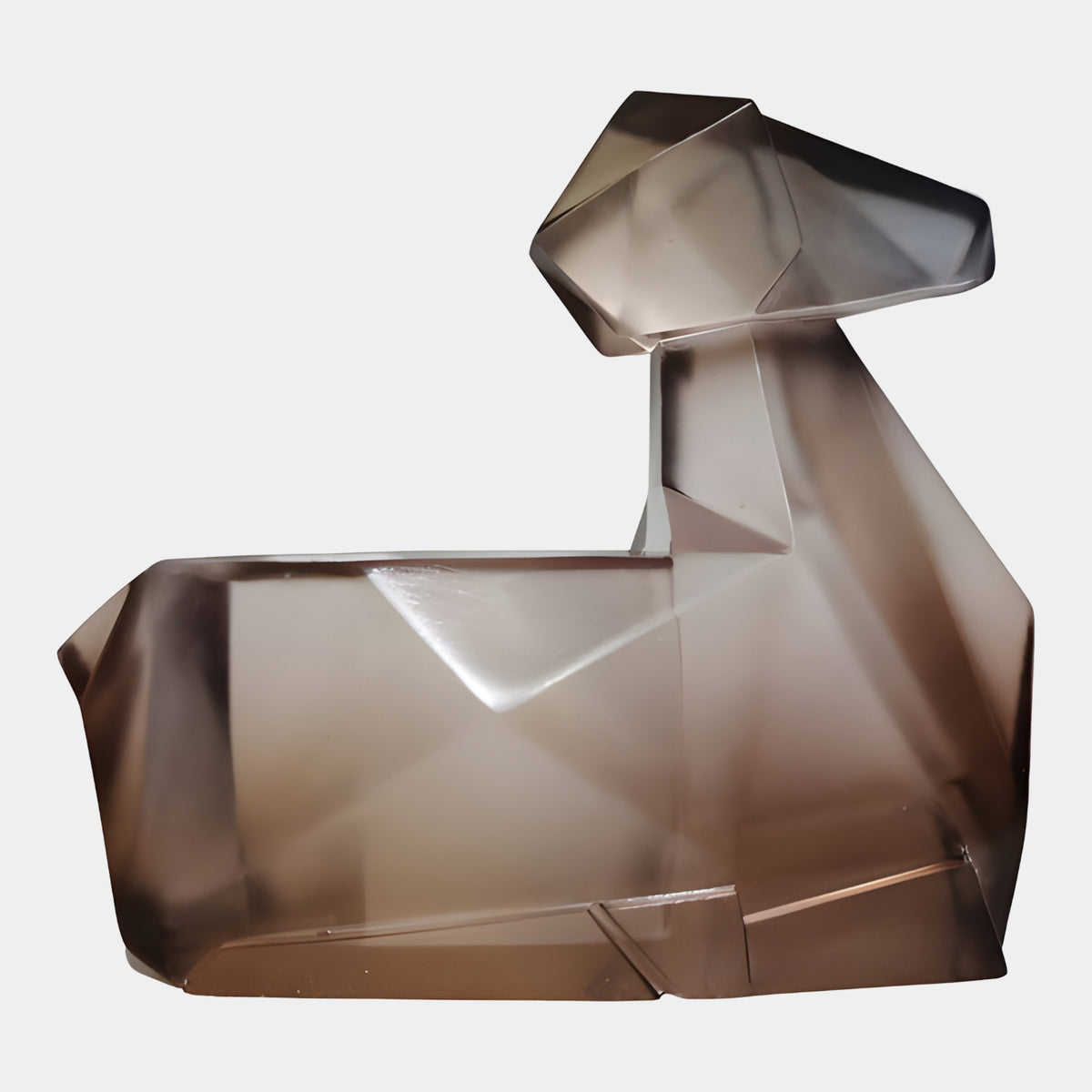 Brown Faceted Animal Cast Resin Sculpture (15cm) by Giant Sculptures, geometric deer-like form lying down, smoky brown resin, plain white background.
