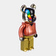 The Rainbow Drip Black Bear Sculpture - 70cm by Giant Sculptures features a glossy black and gold body, shiny gold face, colorful patterns, metallic brown torso, gold legs, and a glossy red and black arm.