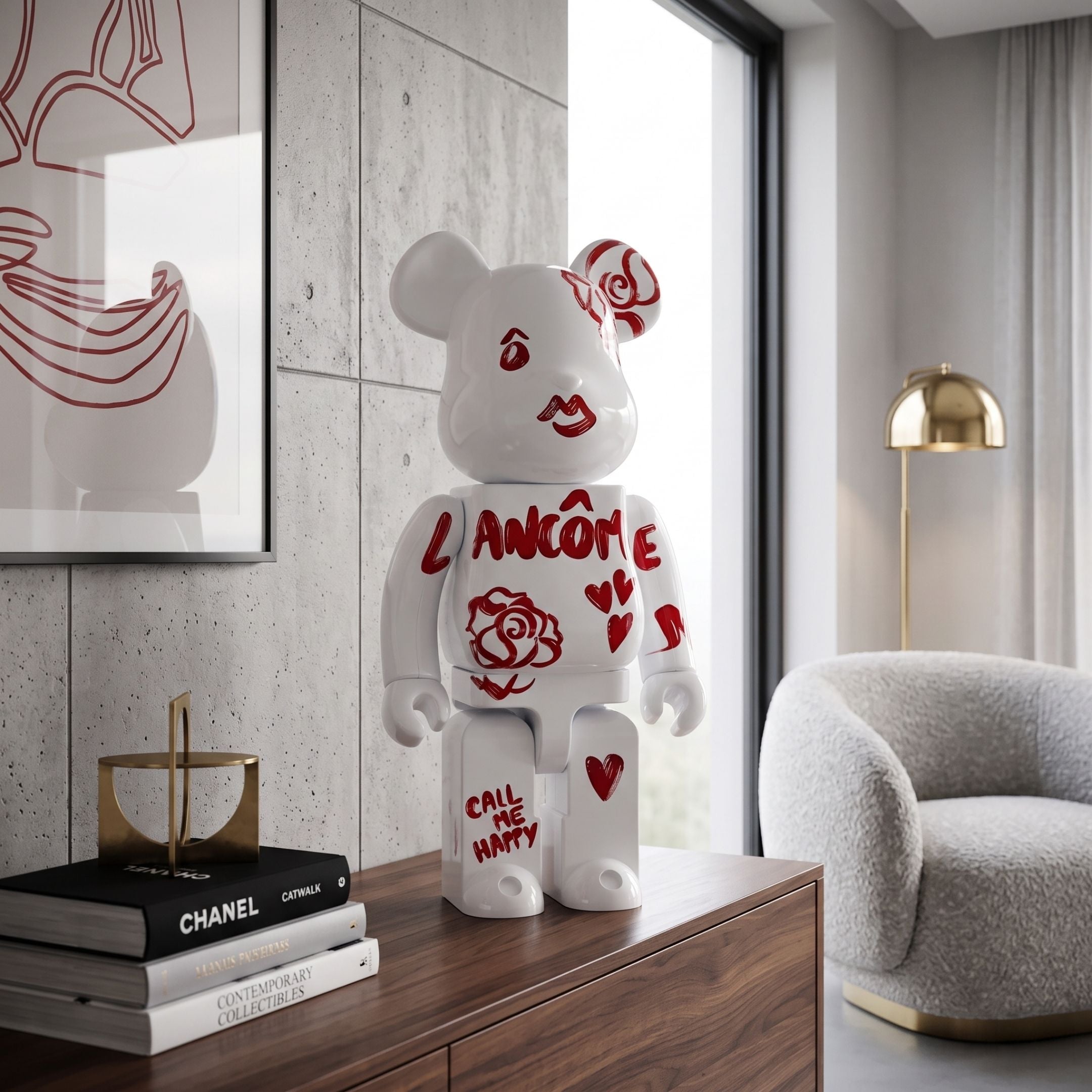 Scarlet Sketch Bear Sculpture - 70cm in white resin with red rose and heart illustrations, displayed on a wooden cabinet beside a grey armchair.