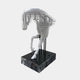 Rising Stallion White Wood Horse Sculpture - 160cm by Giant Sculptures, an abstract horse built from stacked horizontal white wood slabs with a lowered head and raised foreleg, raised on slim black uprights above a dark plinth.