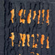 Rivura Navy Layered Sandstone Texture 3D Wall Art close-up showing torn vertical navy strips revealing orange and beige layers beneath.