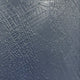 Close-up of Rivura Navy Layered Sandstone Texture 3D Wall Art showing crosshatched navy surface texture with a vertical seam and raised geometric grid pattern.