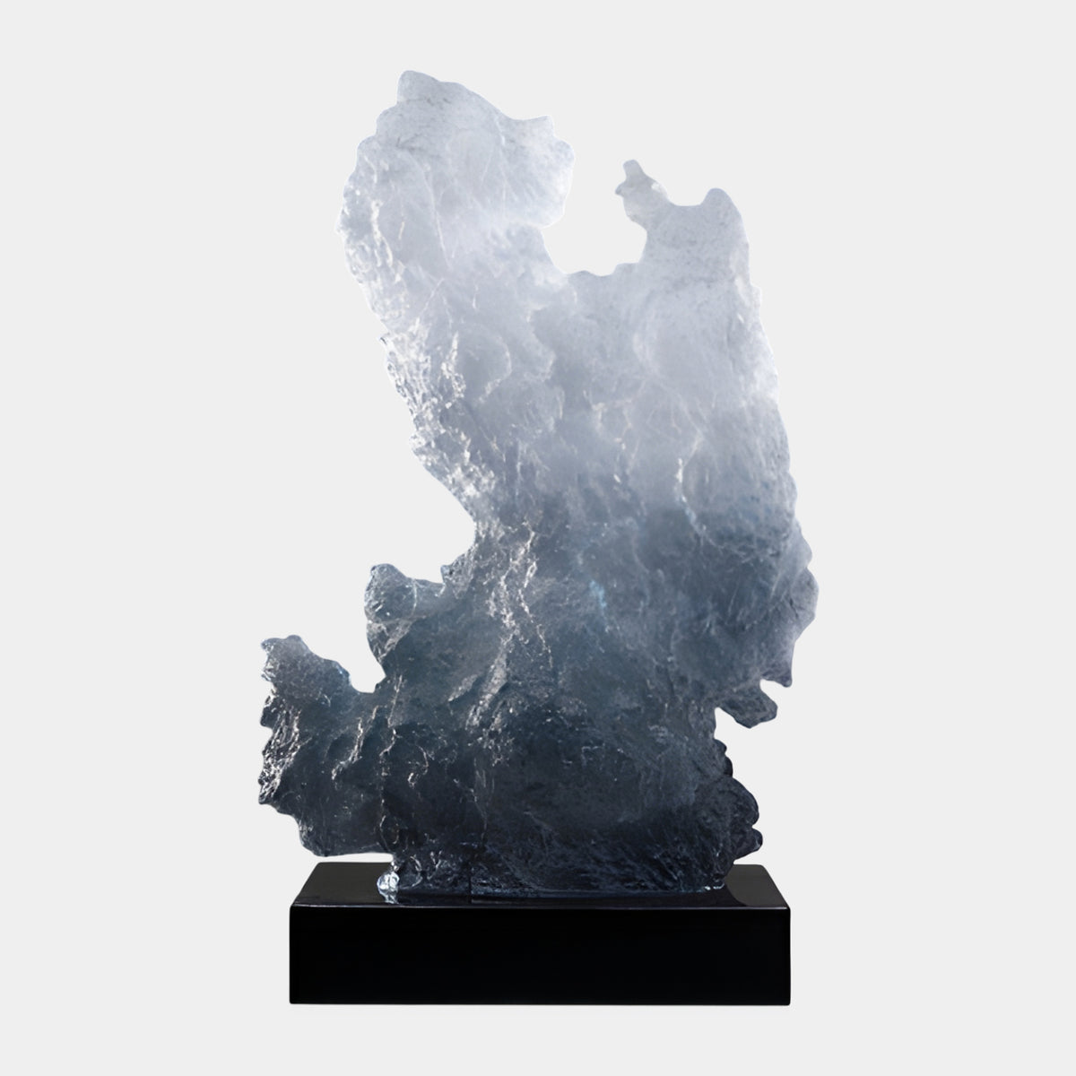 Blue Frosted Standing Rock on Marble Resin Sculpture, 88cm, textured upright form fading from white at the top to slate blue at the base, on a black marble base, plain white background.