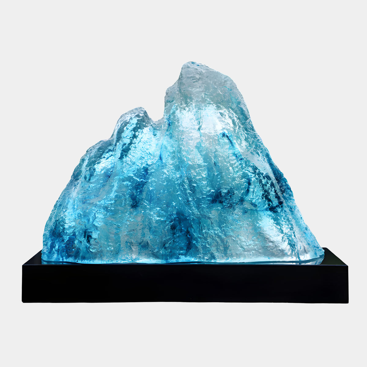 Blue Frosted Twin Peak Cast Resin Sculpture - 70cm, a teal frosted twin-peak resin form on a black marble base, set against a plain white background.