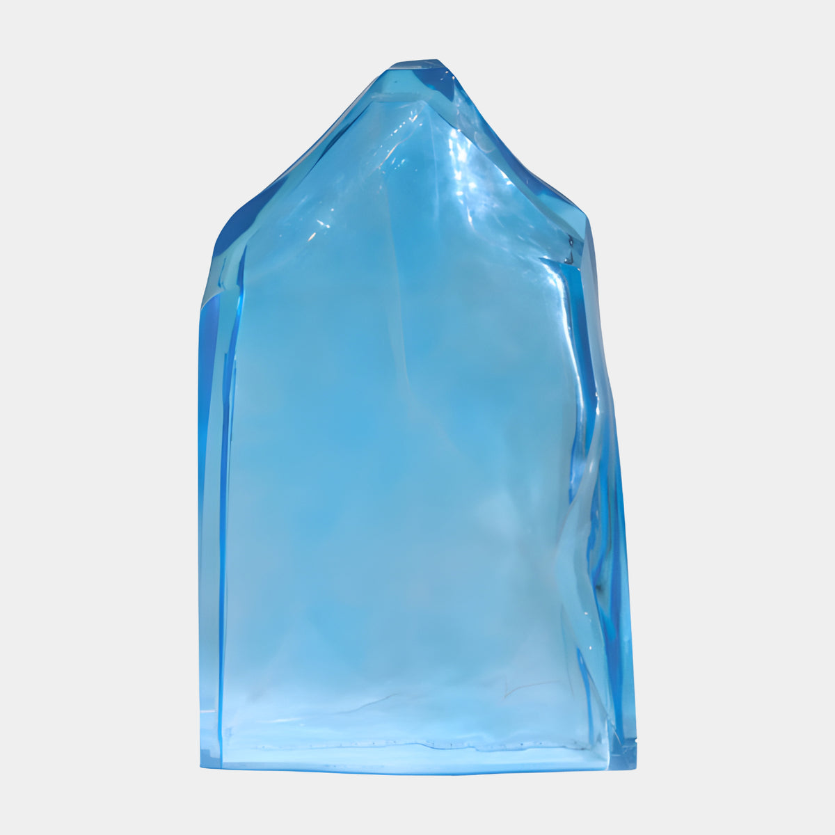Blue Hollow Cast Standing Peak Resin Sculpture - 100cm, a translucent blue peak-shaped form with clean angular faces, standing on its own base against a plain white background.