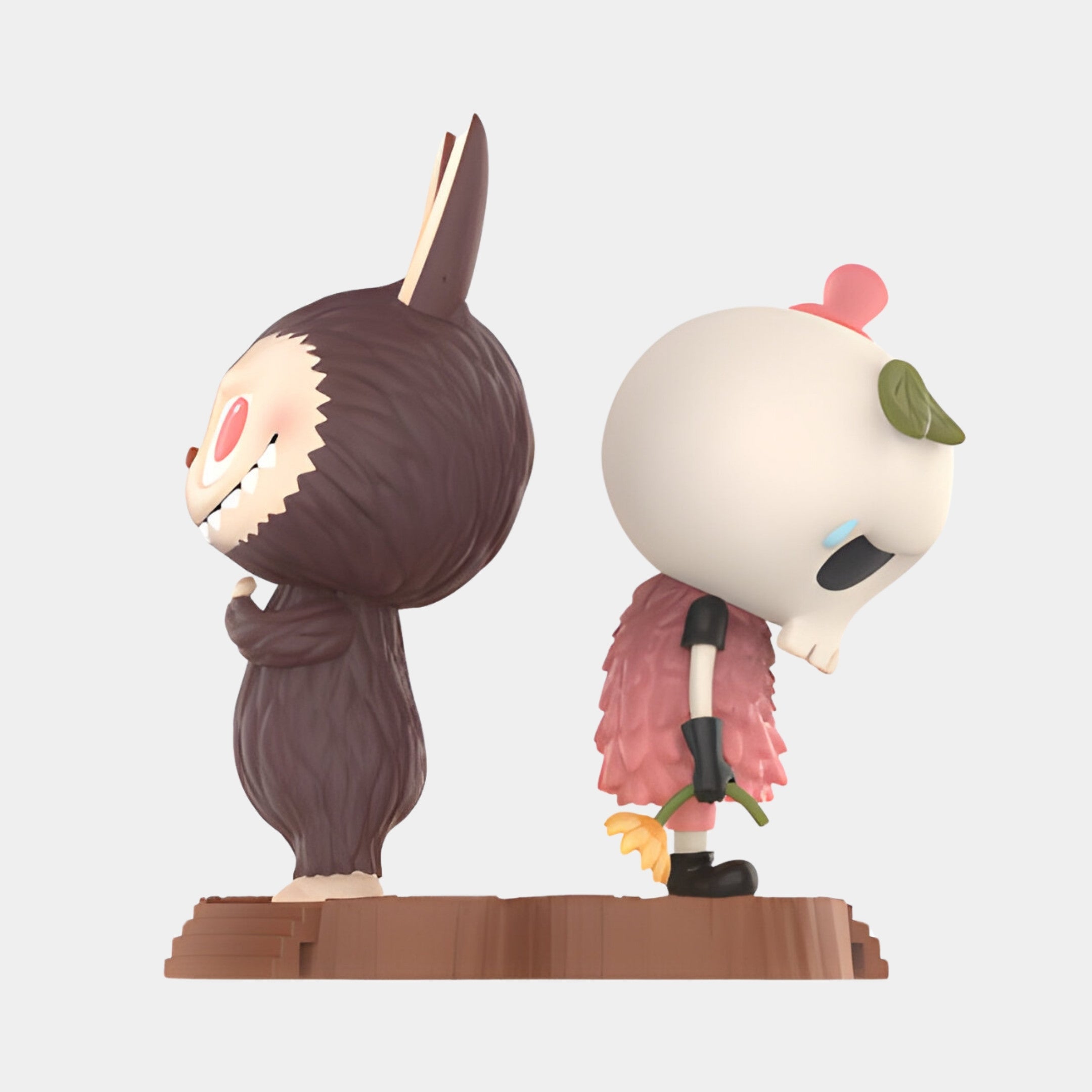 The Giant Sculptures Spooky Buddies Silent Feud Labubu Sculpture (160cm) features two stylized figurines—one grinning in a furry suit, one skull-headed with petal details—standing back-to-back on a brown base for a unique fibreglass display.