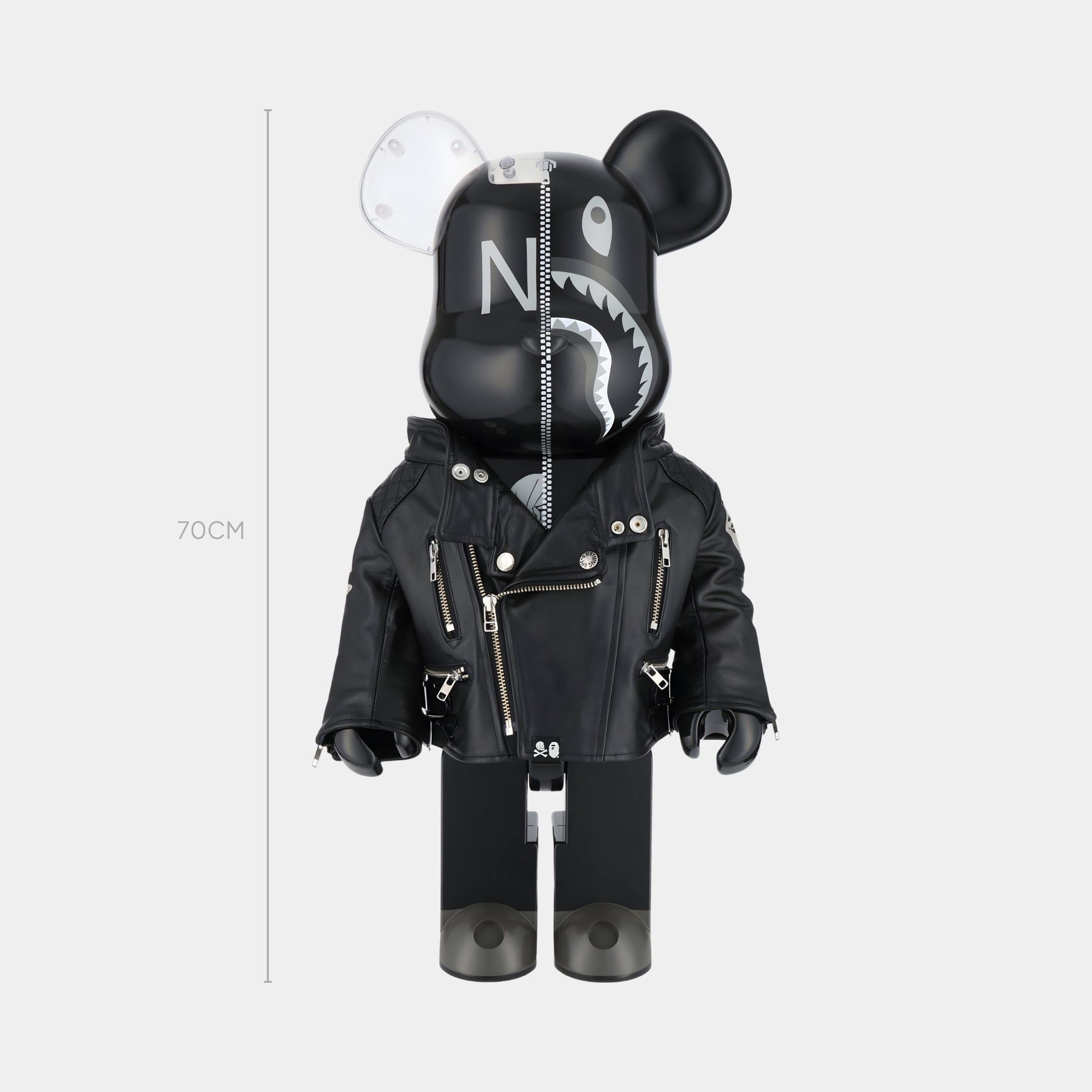 The Giant Sculptures Shark Zipper Black Bear Sculpture - 70cm features a resin frame, black leather jacket, shark teeth face graphics, a clear ear, and comes as a limited-run piece displayed on a plain white background.