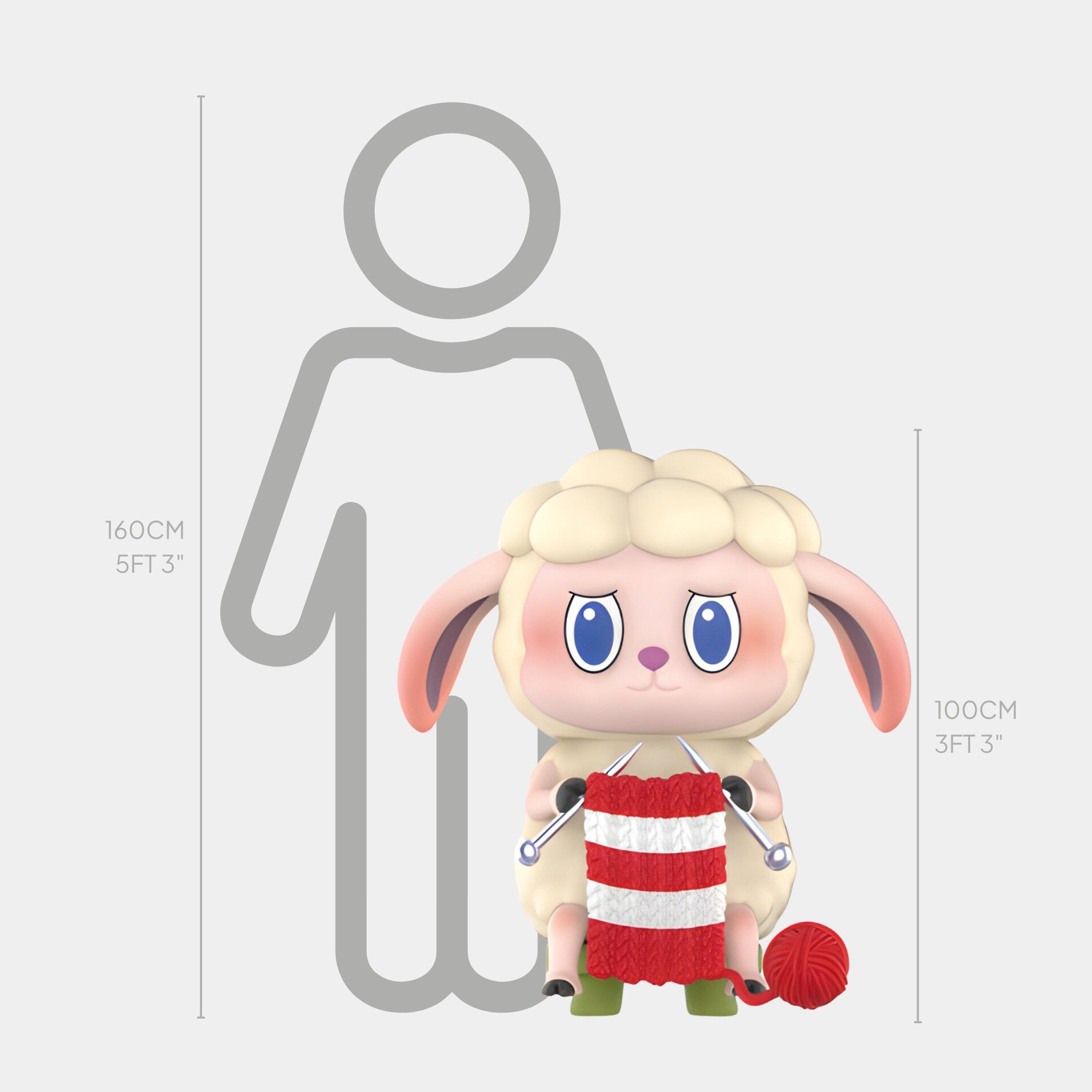 A cartoon sheep with pink ears and big blue eyes knits a red and white scarf by a height chart. This cute indoor piece is the Animal Sheep Labubu Sculpture - 100cm from Giant Sculptures, standing about 3 ft 3 in tall.