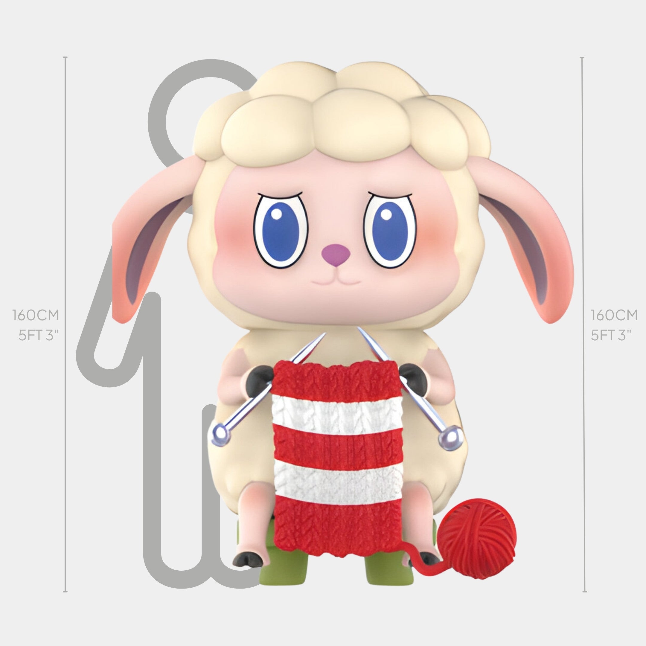 The Animal Sheep Labubu Sculpture - 160cm by Giant Sculptures features a cute cartoon sheep with floppy ears, knitting a red and white striped scarf beside a red yarn ball. Made from fibreglass, it makes a whimsical indoor display.