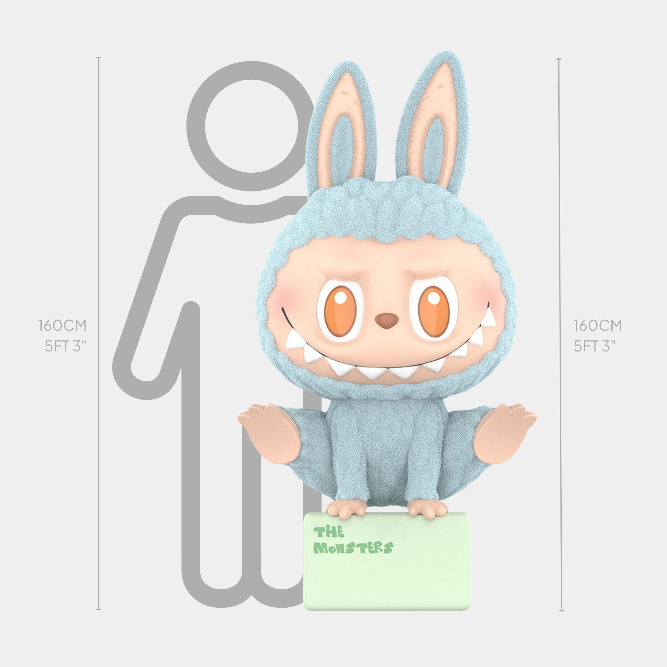 The Lazy Yoga Show Off Labubu Sculpture by Giant Sculptures stands 160cm tall, featuring big orange eyes, sharp teeth, bunny ears, a blue fuzzy costume, and a green THE MONSTERS block—perfect for creative offices or yoga show-off spaces.
