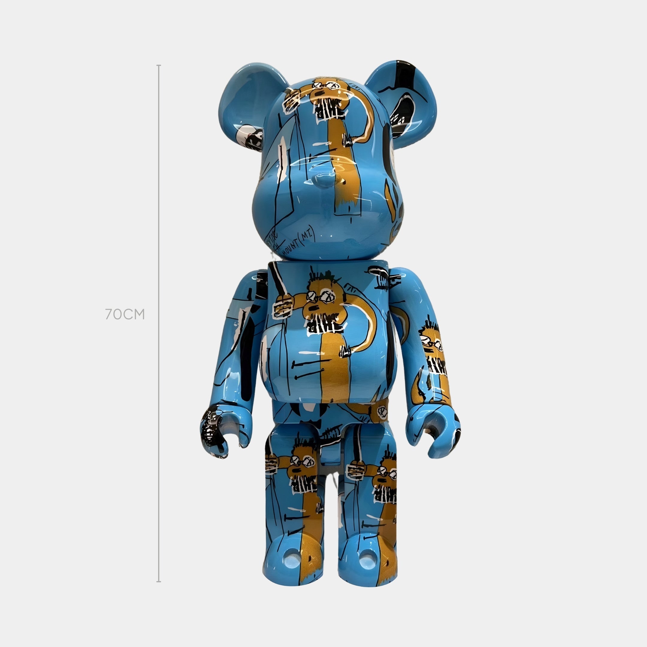 The Skyline Scribble Bear Sculpture - 70cm by Giant Sculptures features blue tones, gold, black, and white abstract designs with cartoon faces—ideal for adding urban artistry to modern spaces. Shown against a plain light background.