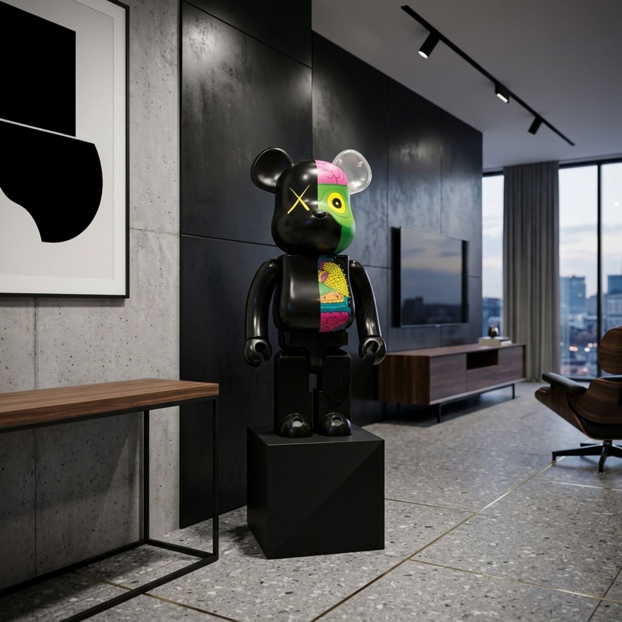 Split Anatomy Black Bear Sculpture, 70cm, on a black plinth in a modern living room with a dark accent wall, TV console, and city-view windows.