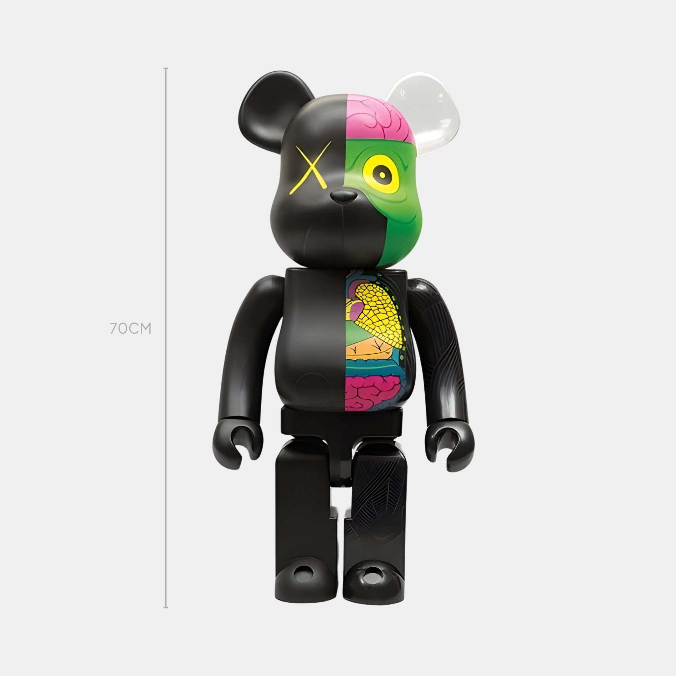 The Split Anatomy Black Bear Sculpture - 70cm by Giant Sculptures features a striking black bear with split anatomy—one half classic black, the other exposing colorful organs, brain, eye, yellow X detail, and mismatched ears. A bold neo-anatomical statement piece.