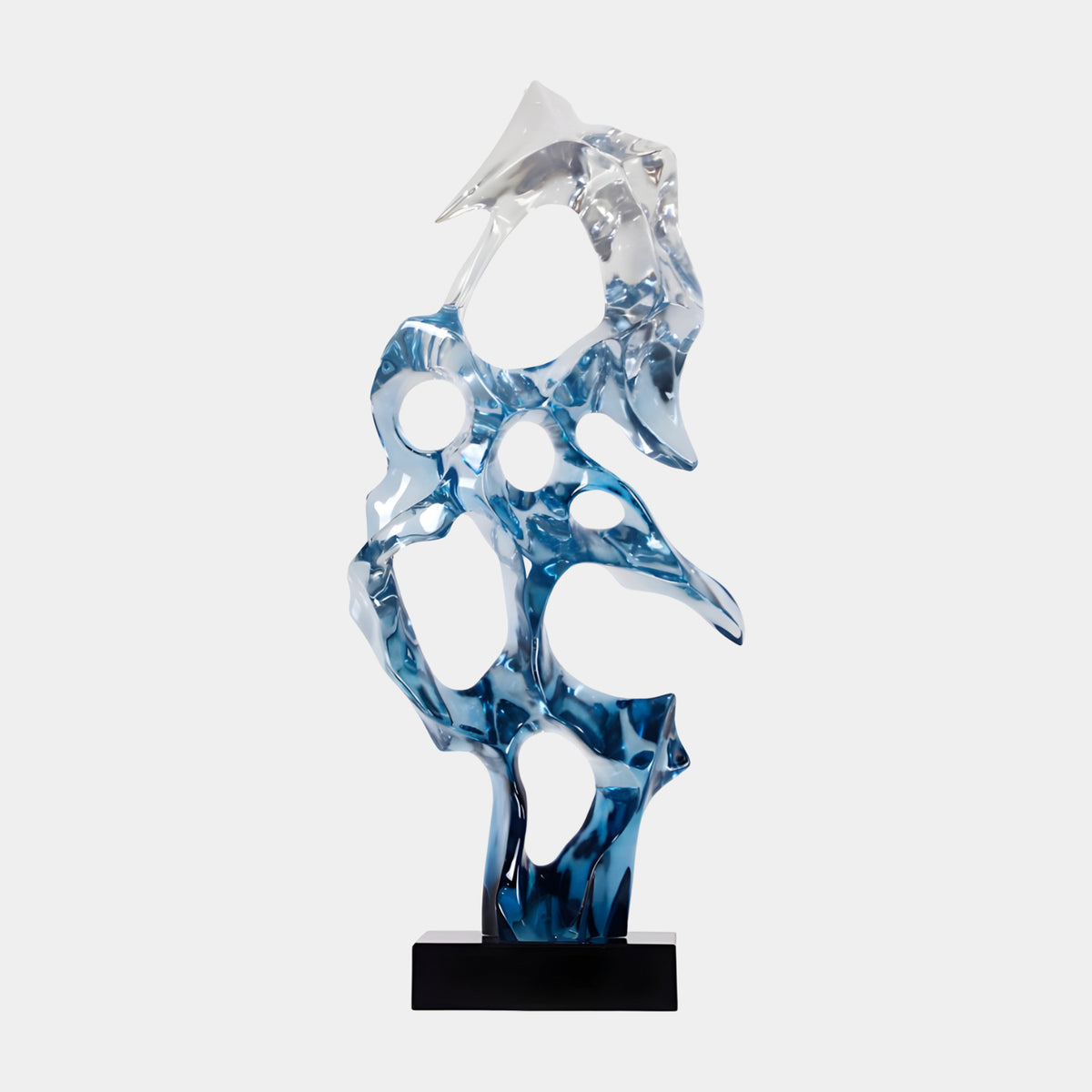 Steel Blue Pierced Fin Cast Resin Sculpture - 83cm, an upright pierced abstract form shading from clear to steel blue, on a black marble base, shown against a plain white background.