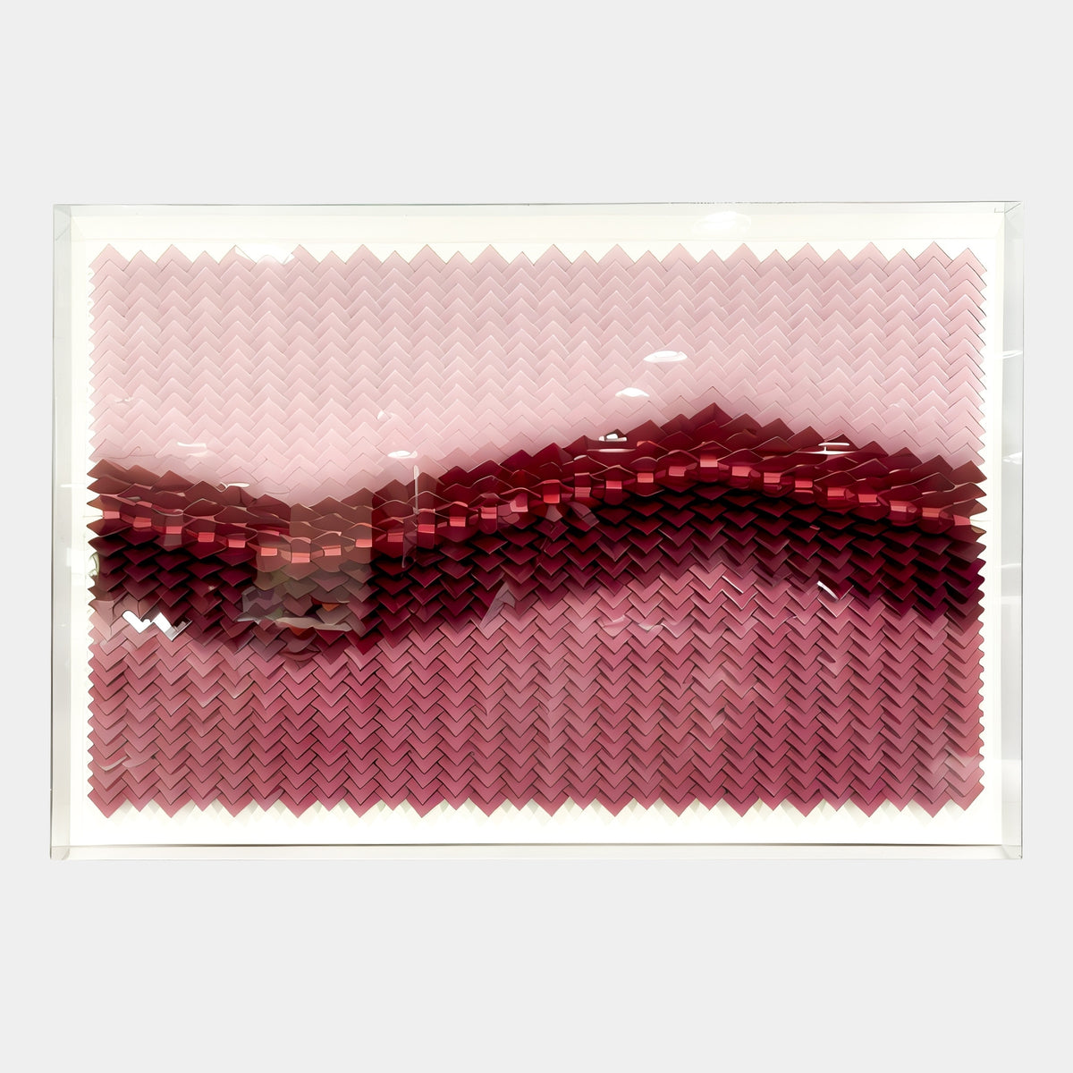 Tessera Blush Rose & Mulberry Line Acrylic 3D Wall Art featuring overlapping zigzag acrylic rows in blush pink and mulberry tones, framed against a white background.