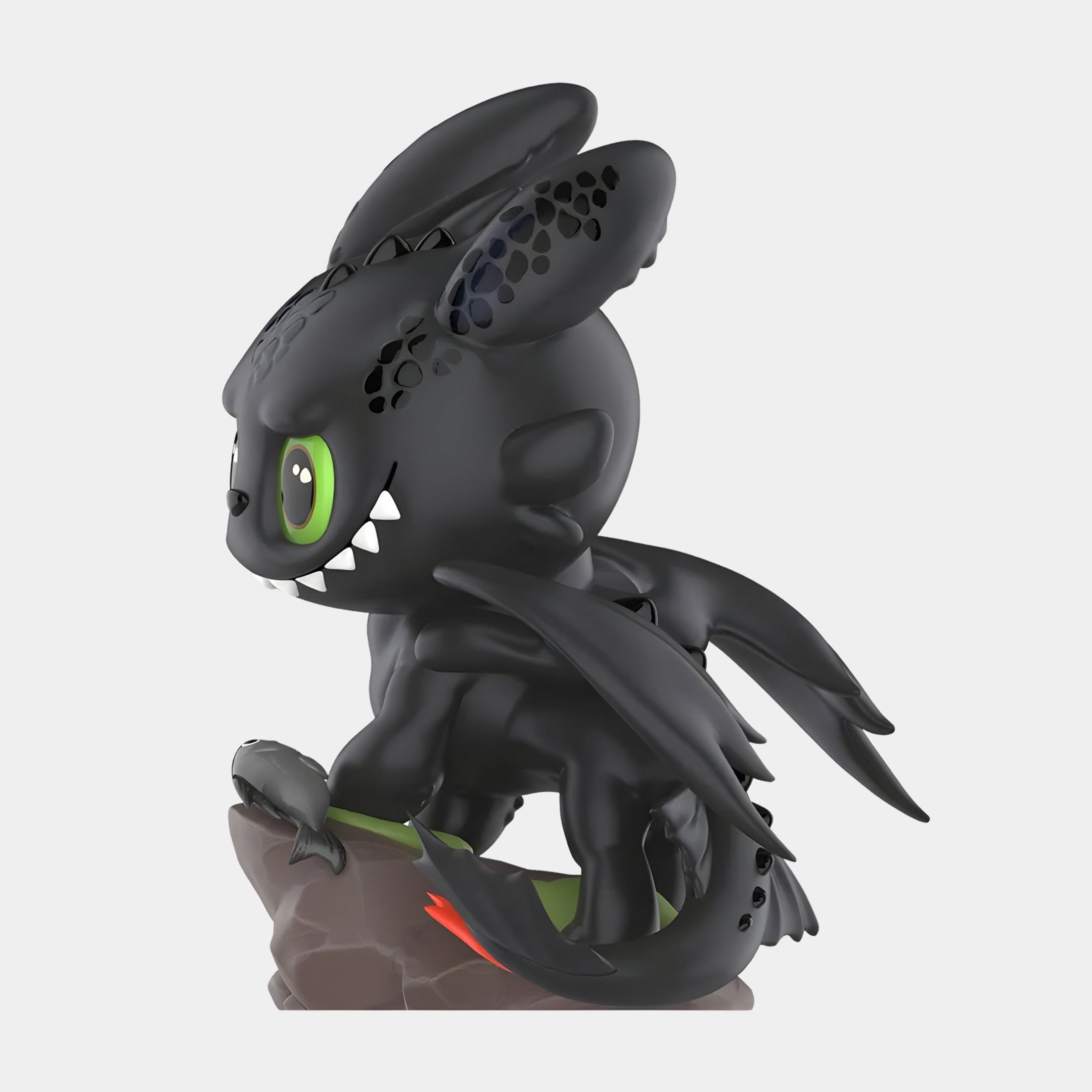 The Giant Sculptures Dragon Bond Toothless Labubu Sculpture (160cm) features a cute, stylized black dragon with large green eyes, tiny wings, and a playful look—perfect for fans of fantasy art and collectibles.