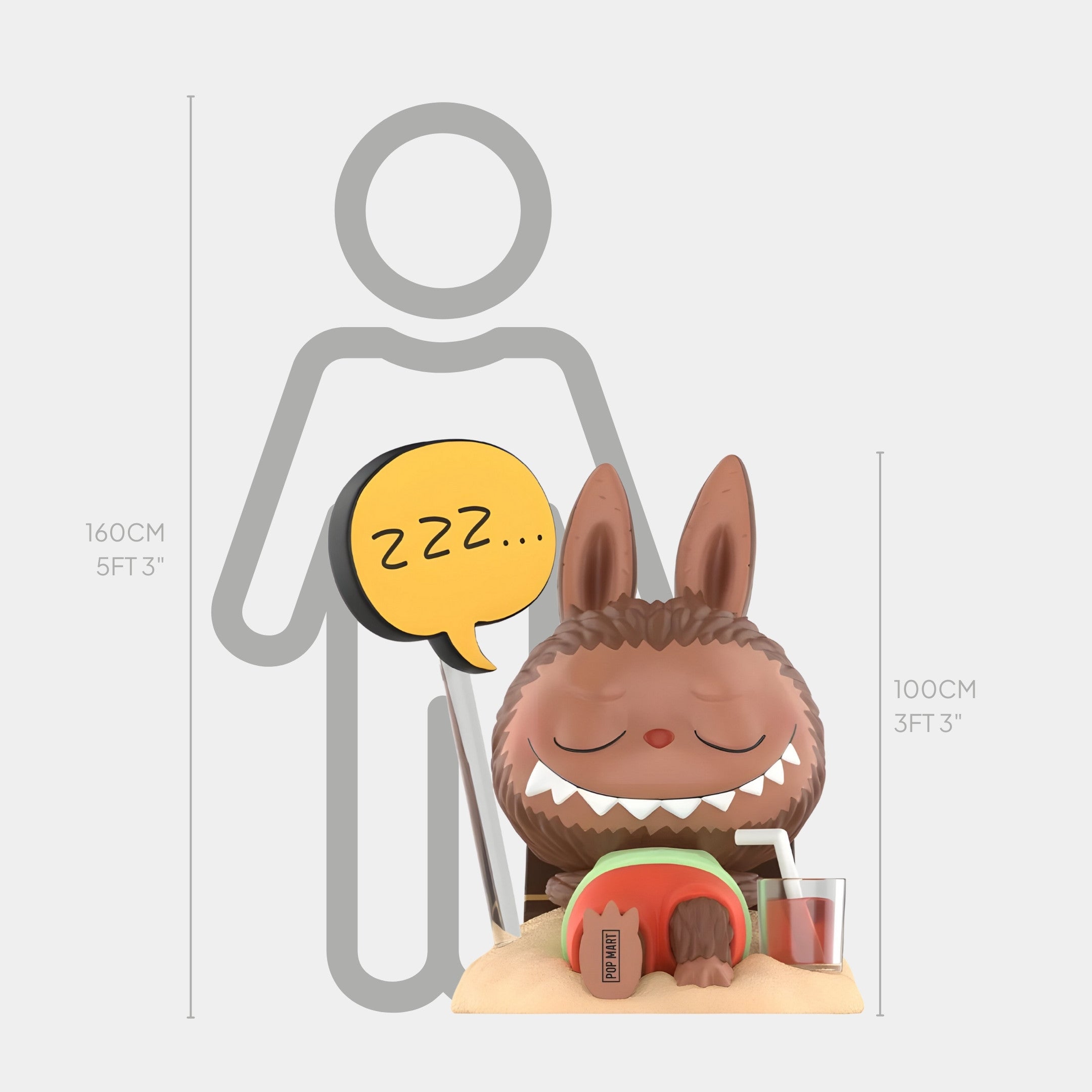 The Giant Sculptures Triangle Chocolate Candy Labubu Sculpture stands 100cm tall. This large, cartoonish piece features a brown Labubu with big ears, orange sunglasses, holding a “zzz…” sign and napping on sand with a drink beside it; grey silhouette shows scale.