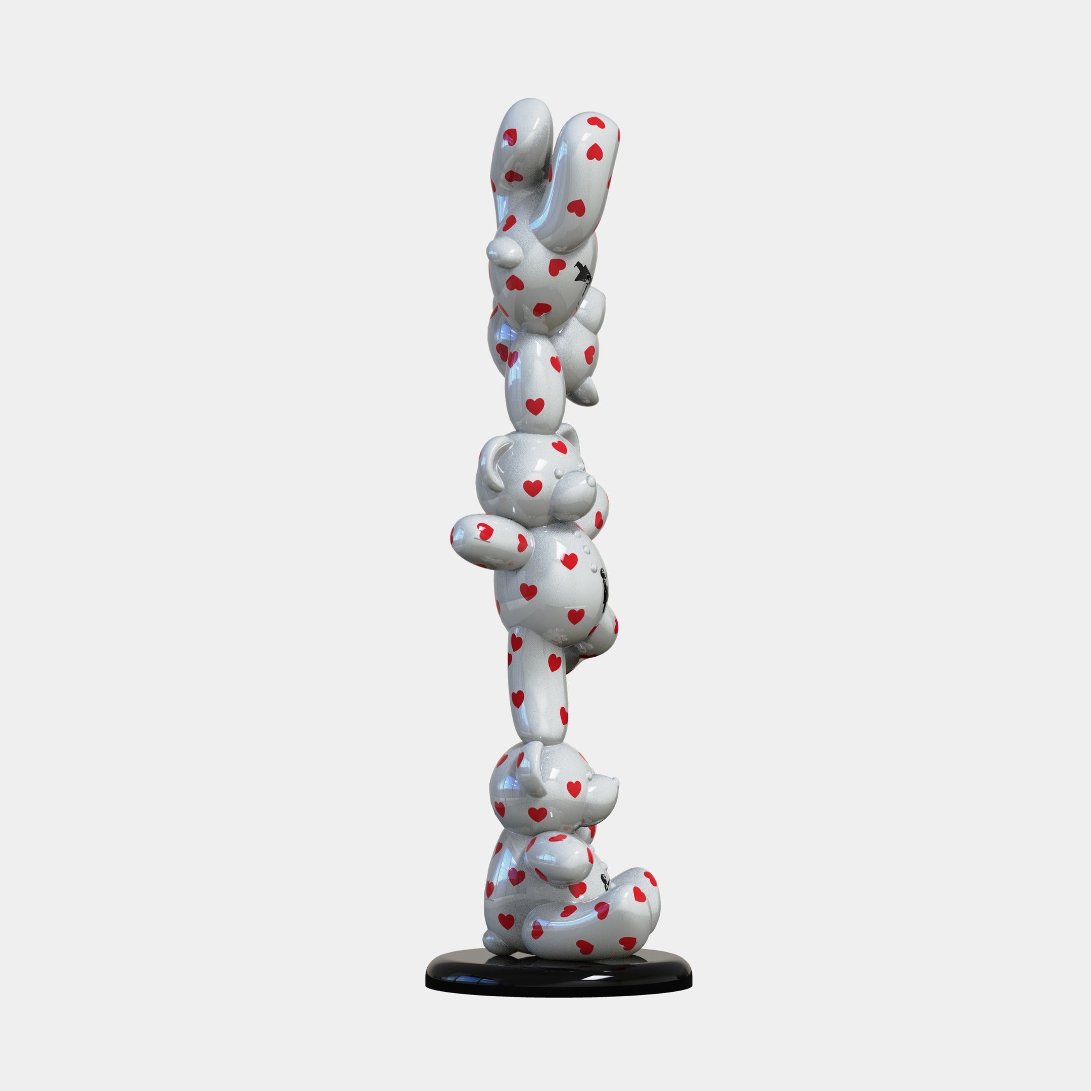 The Giant Sculptures Gacko Banksy Triple Bear Sculpture (90cm) features stacked white balloon-like bears with red hearts, crafted from fibreglass on a black circular base—the perfect playful contemporary art piece.
