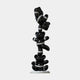 The Gacko Black Chanel Triple Bear Sculpture (90cm) by Giant Sculptures features three glossy black bears stacked with white “CHANEL” ribbon on a white base, making a bold statement in contemporary art decor.