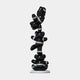 The Gacko Black Chanel Triple Bear Sculpture by Giant Sculptures stands 90cm tall, featuring shiny black bears with white CHANEL bands on a circular base—an eye-catching piece of contemporary art decor.