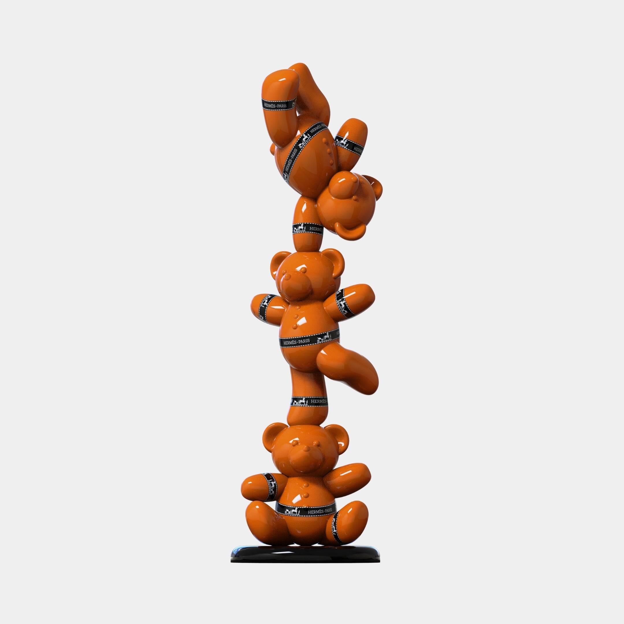 The Gacko Hermes Triple Bear Sculpture - 90cm by Giant Sculptures features three orange bears stacked vertically with black “fragile” bands, creating a playful, contemporary design against a plain white background.