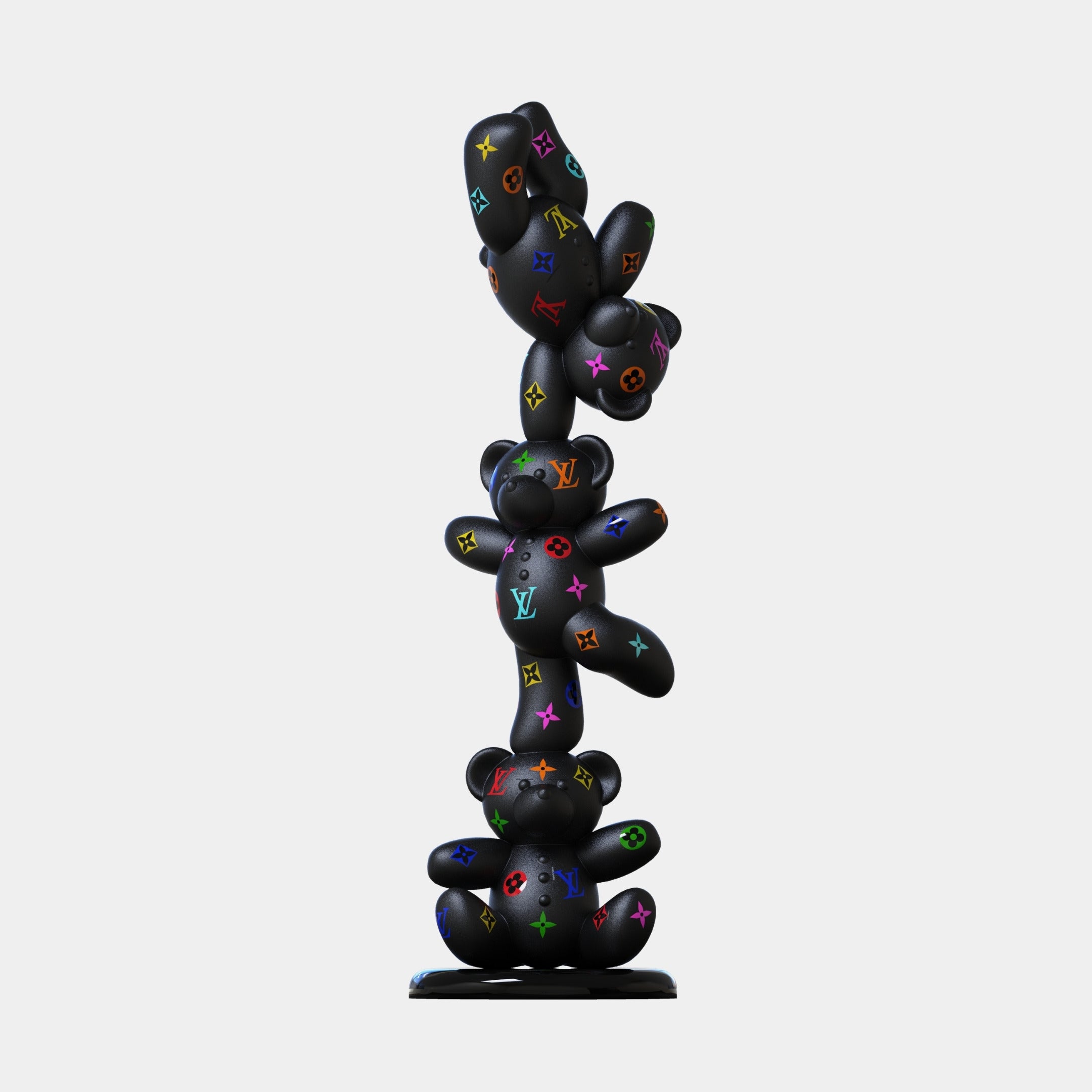 The Gacko Matte Multicoloured LV Triple Bear Sculpture - 90cm by Giant Sculptures features three stacked black teddy bears with colorful LV-inspired symbols, set on a round base against a plain backdrop.
