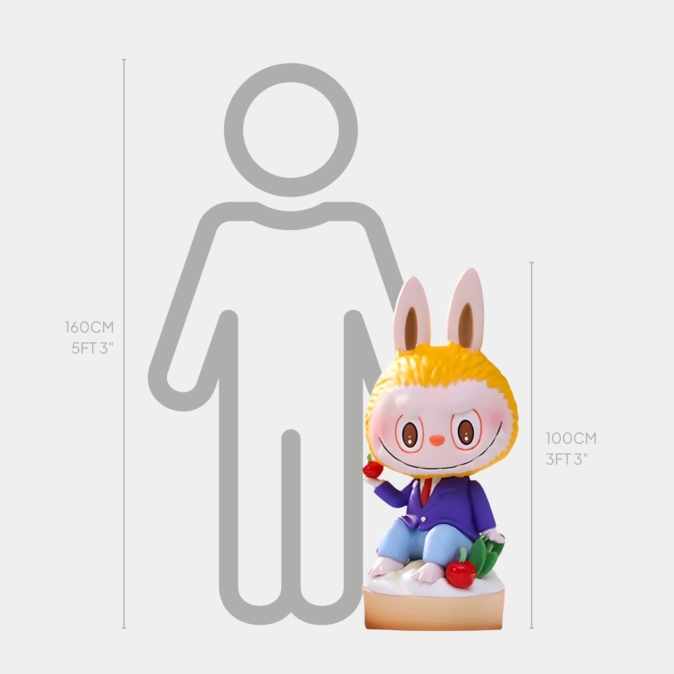 The Giant Sculptures Sweet Mischief Cherry Cake Labubu Sculpture stands 100 cm (3 ft 3 in) tall, depicted holding apples before a gray person outline measuring 160 cm (5 ft 3 in), highlighting its dessert-inspired design.
