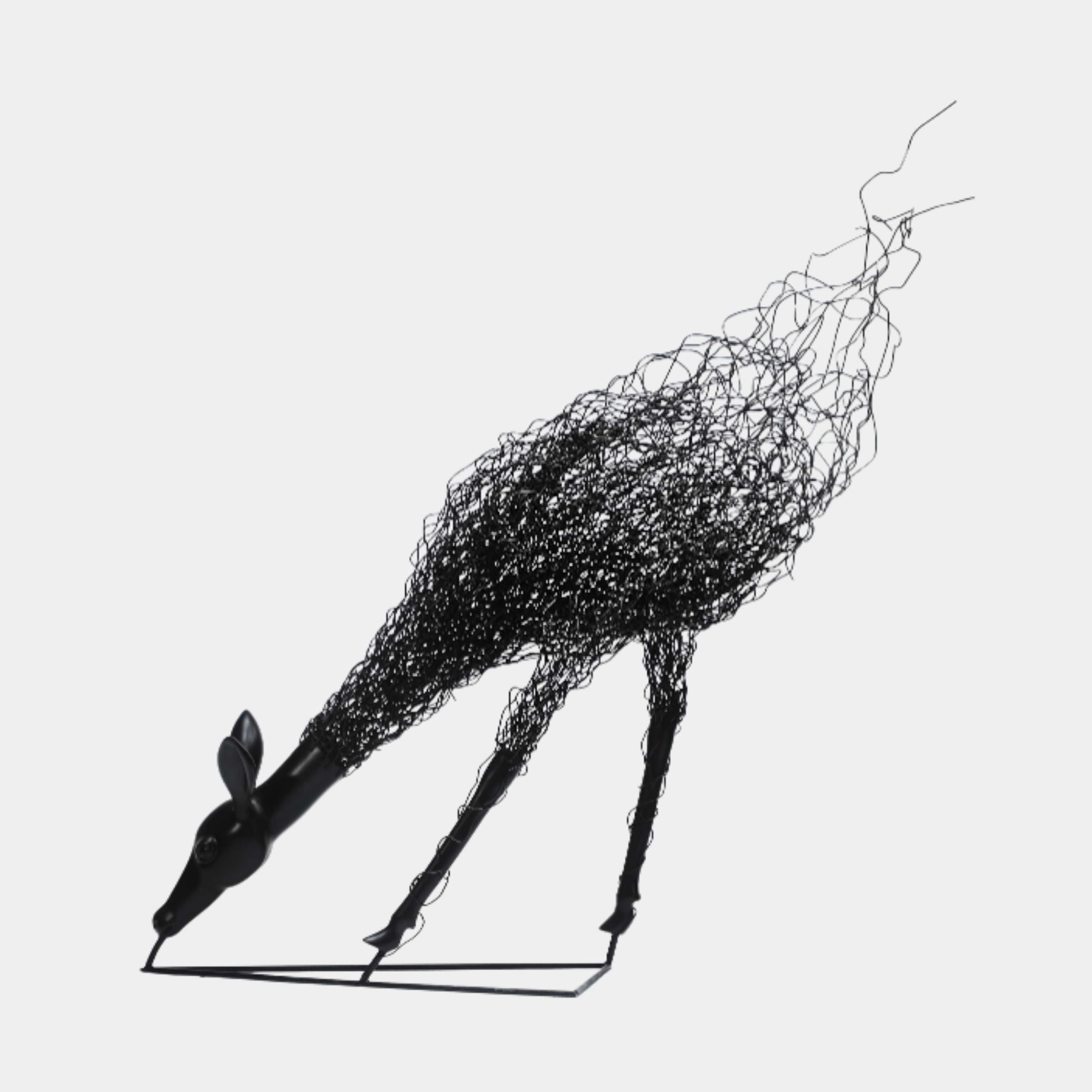 Black Abstract Grazing Deer Wire Metal Sculpture by Giant Sculptures, 158cm, with solid head lowered to graze and a tangled wire body, on a plain background.