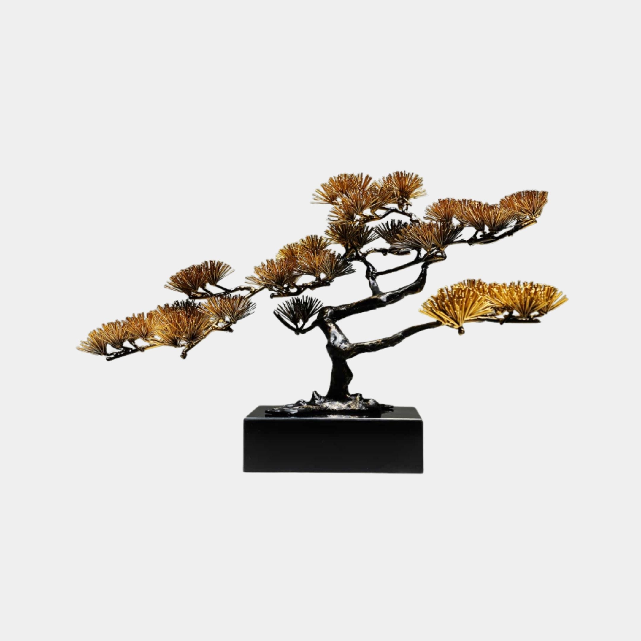 Gold Needle-Leaf Pine Bonsai Tree Metal Sculpture by Giant Sculptures, dark hammered trunk with golden fan-shaped needle clusters on a black rectangular base.