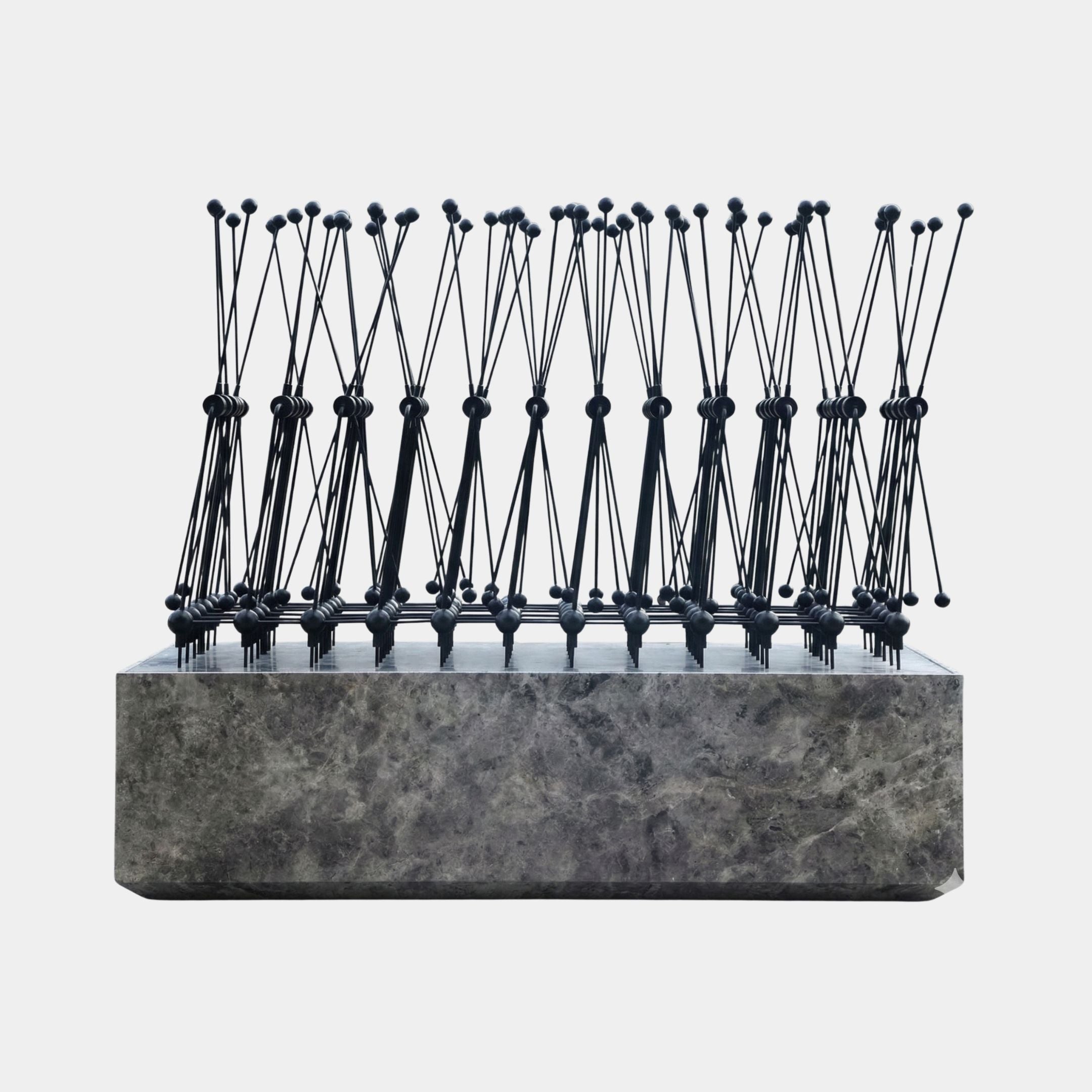 Giant Sculptures Black Kinetic Reed Metal Installation on Marble Base 209cm, dense rows of slender black rods with ball finials rising from a grey marble block.
