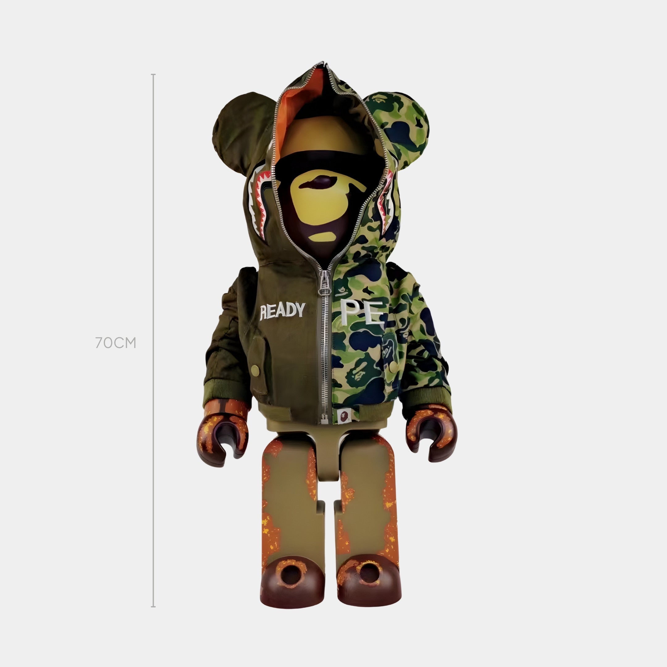 The Giant Sculptures Valor Split Bear Sculpture - 70cm showcases streetwear style with a military-green half-hoodie, shark-hood detail, brown gloves, camo pants, and a plain light gray background.
