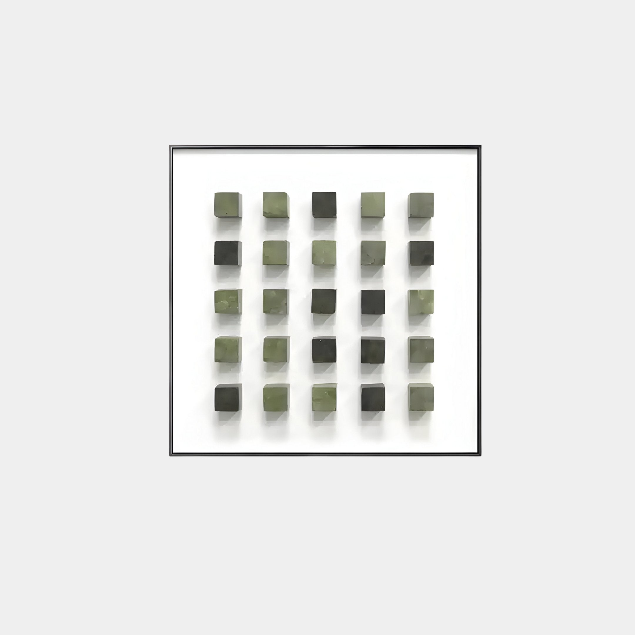 The Cubitara Green Gradient Wood Block 3D Wall Art by Giant Sculptures features 25 green, square tiles in a 5x5 grid against a white background. The tiles subtly varying in shade create a textured, three-dimensional effect.