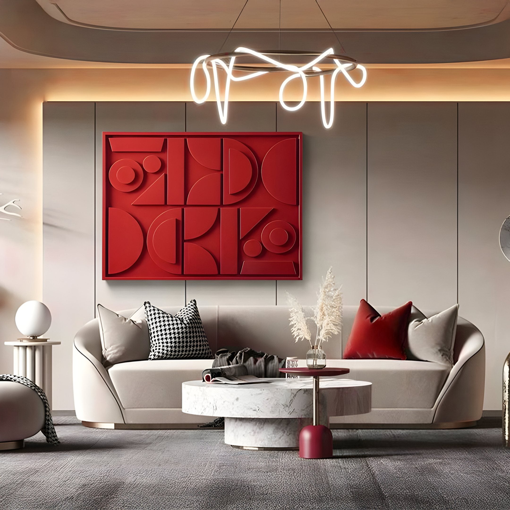 A modern living room features a beige sofa with assorted pillows, a round marble coffee table, and the Formate Vibrant Red Geometric Wood Painted 3D Wall Art by Giant Sculptures. A creative twisted light fixture hangs to enhance the contemporary decor with an energetic splash of color.