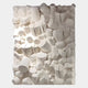 The Forme III Cream Wood Cluster Abstract 3D Wall Art by Giant Sculptures features white, cylindrical and irregularly shaped elements arranged together to create a modern, textured pattern reminiscent of organic geometry.