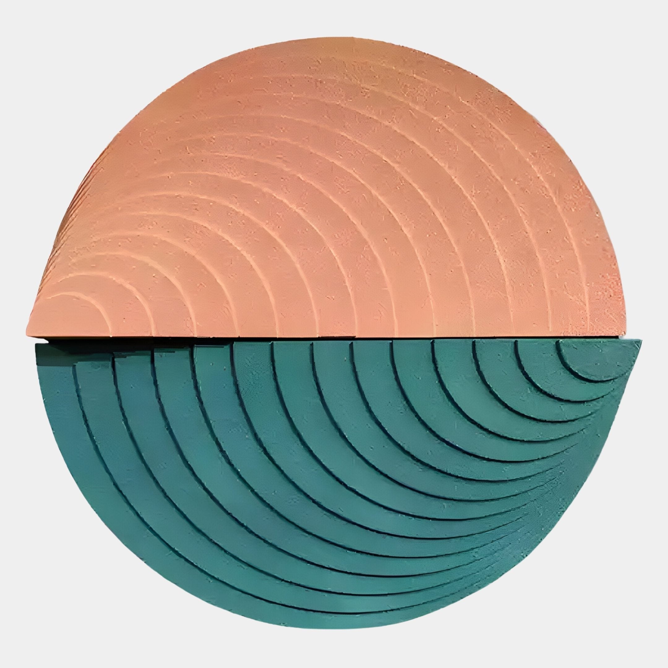 The Orbitals Peach & Teal Circular Wood Carved Sandstone 3D Wall Art by Giant Sculptures features a handcrafted geometric design, with a peach top half and teal bottom, both adorned with textured concentric arcs for a striking abstract look.