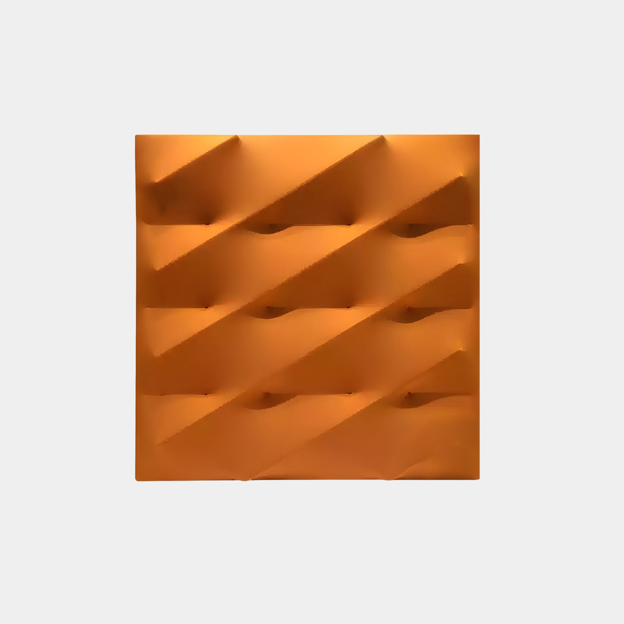 The Verto Vibrant Orange Stretch Fabric Layered Wooden 3D Wall Art by Giant Sculptures features raised geometric patterns and diagonal grooves on a white background, creating a textured, three-dimensional effect ideal for contemporary interiors.