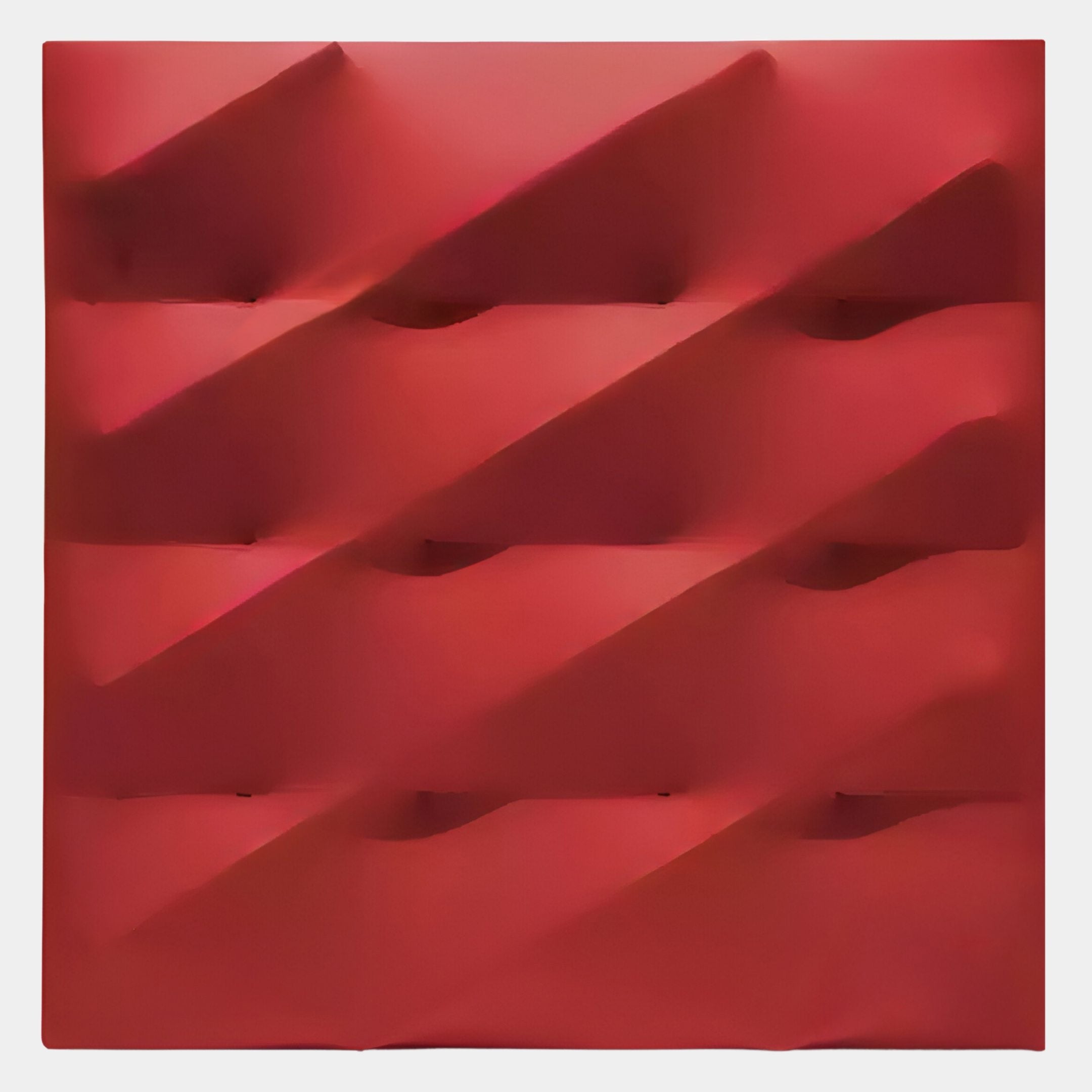 The Verto Bold Red Stretch Fabric Layered Wooden 3D Wall Art by Giant Sculptures features diagonal ridges and smooth grooves, creating a striking abstract geometric pattern—ideal for modern interiors seeking a bold statement piece.