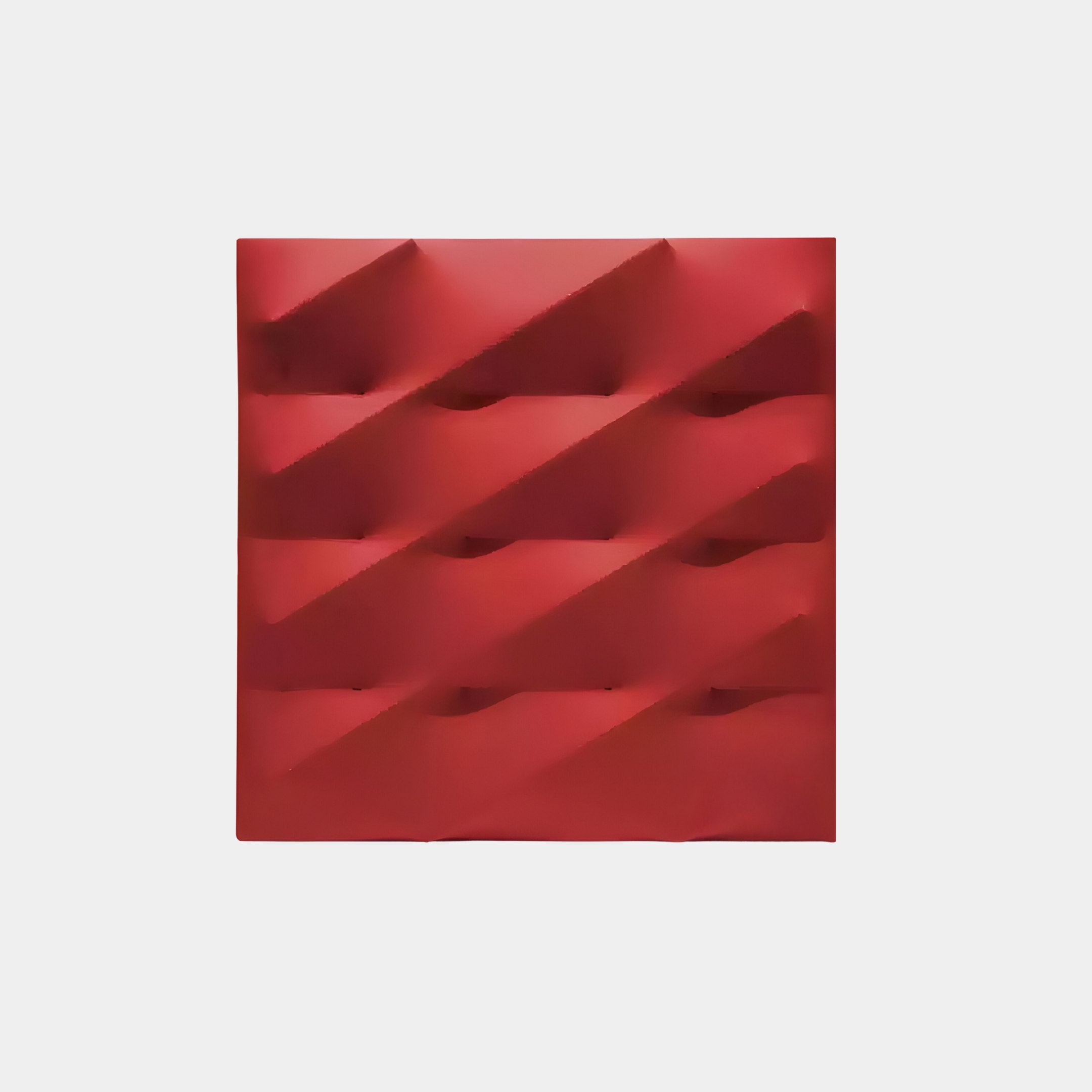 The Verto Bold Red Stretch Fabric Layered Wooden 3D Wall Art by Giant Sculptures features a striking geometric pattern with diagonal ridges on a white backdrop, offering an illusion of depth and texture, making it perfect for enhancing any modern interior space.