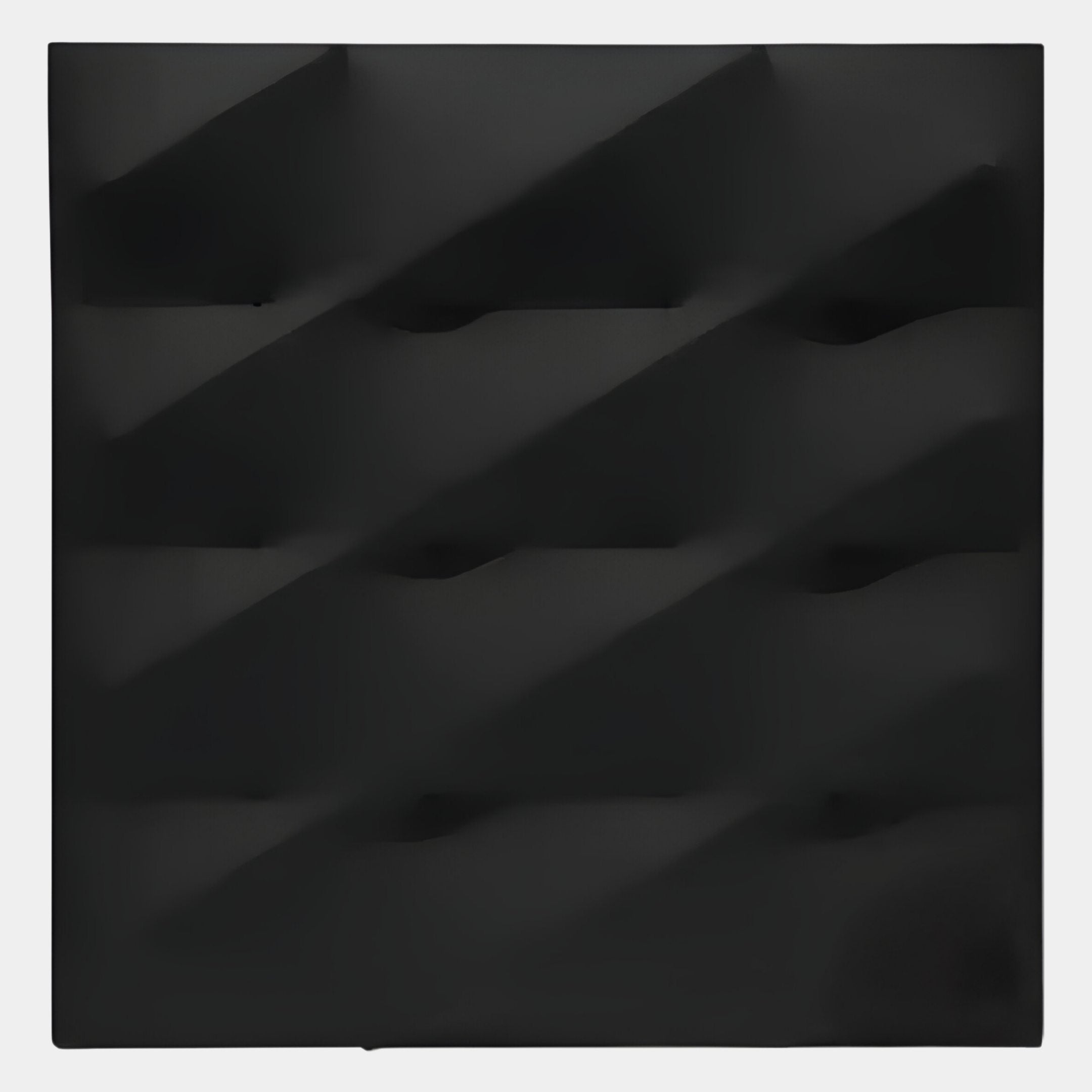 The Verto Black Stretch Fabric Layered Wooden 3D Wall Art by Giant Sculptures features a square black surface with geometric ridges and recesses, creating a modern, shadowed effect that exemplifies minimalism and makes a striking wall statement.