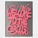 The Urbanic Pink Welcome Script 3D Wooden Graffiti Wall Art by Giant Sculptures features bright pink, overlapping graffiti-style text on gray with soft shadows and urban flair, spelling WELCOME WELCOME TO THE CIRCUS.