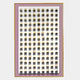 The Artiora Pink Edge & Wood Block Modular Grid 3D Wall Art by Giant Sculptures features a grid of small white house shapes on a white background, mounted on a pink panel with a yellow border, creating striking light and shadow patterns.