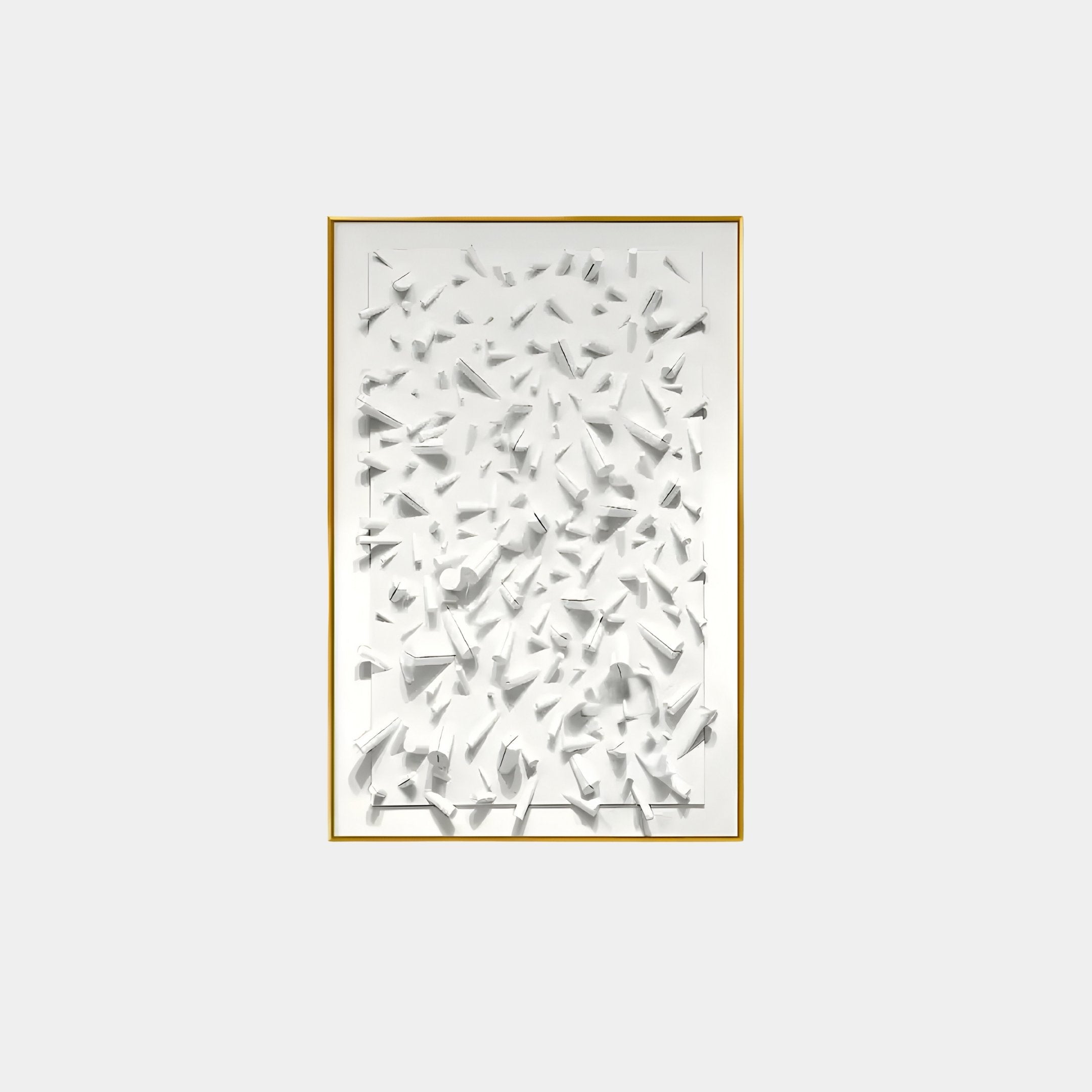 The Artiora White Abstract Wooden Shard 3D Wall Art by Giant Sculptures features a textured white canvas with 3D geometric shapes in an abstract pattern, framed in simple gold against a gray background.