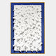 The Artiora Blue Edge & White Abstract Wooden Shard 3D Wall Art by Giant Sculptures features white geometric forms on a blue background with a slim gold frame—perfect for adding modern, minimalist style to your space.