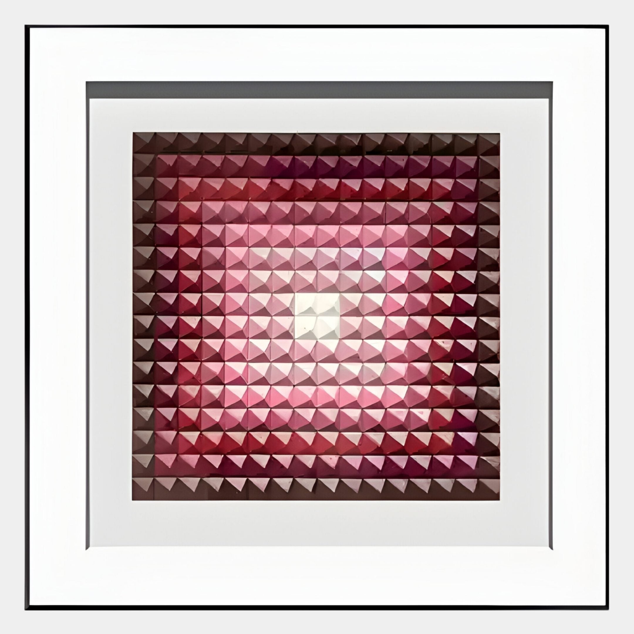 The Viretta Red Gradient Pyramid Textured 3D Wooden Wall Art by Giant Sculptures features a striking grid of red, pink, and brown pyramid tiles radiating from a white center—an eye-catching statement piece for any wall.