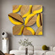 The Lignos Yellow Accent Wooden Leaf Motif 3D Wall Art by Giant Sculptures features interlocking wood with yellow geometric shapes forming an abstract design. It is displayed on a gray wall above a minimalist console table adorned with decorative vases and a small plant.