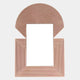 The Aurellis Pink Arch & Square Geometric Mirror Frame Wall Art by Giant Sculptures features a semicircular top and square bottom with rose-gold concentric lines, making it an ideal modern wall art piece for contemporary interiors.