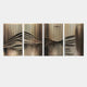 The Harmonic Forms 4-Panel Rustic Bronze Wood Carving 3D Wall Art by Giant Sculptures features abstract panels with vertical gold and black lines, creating a wavy pattern and the illusion of depth and movement.