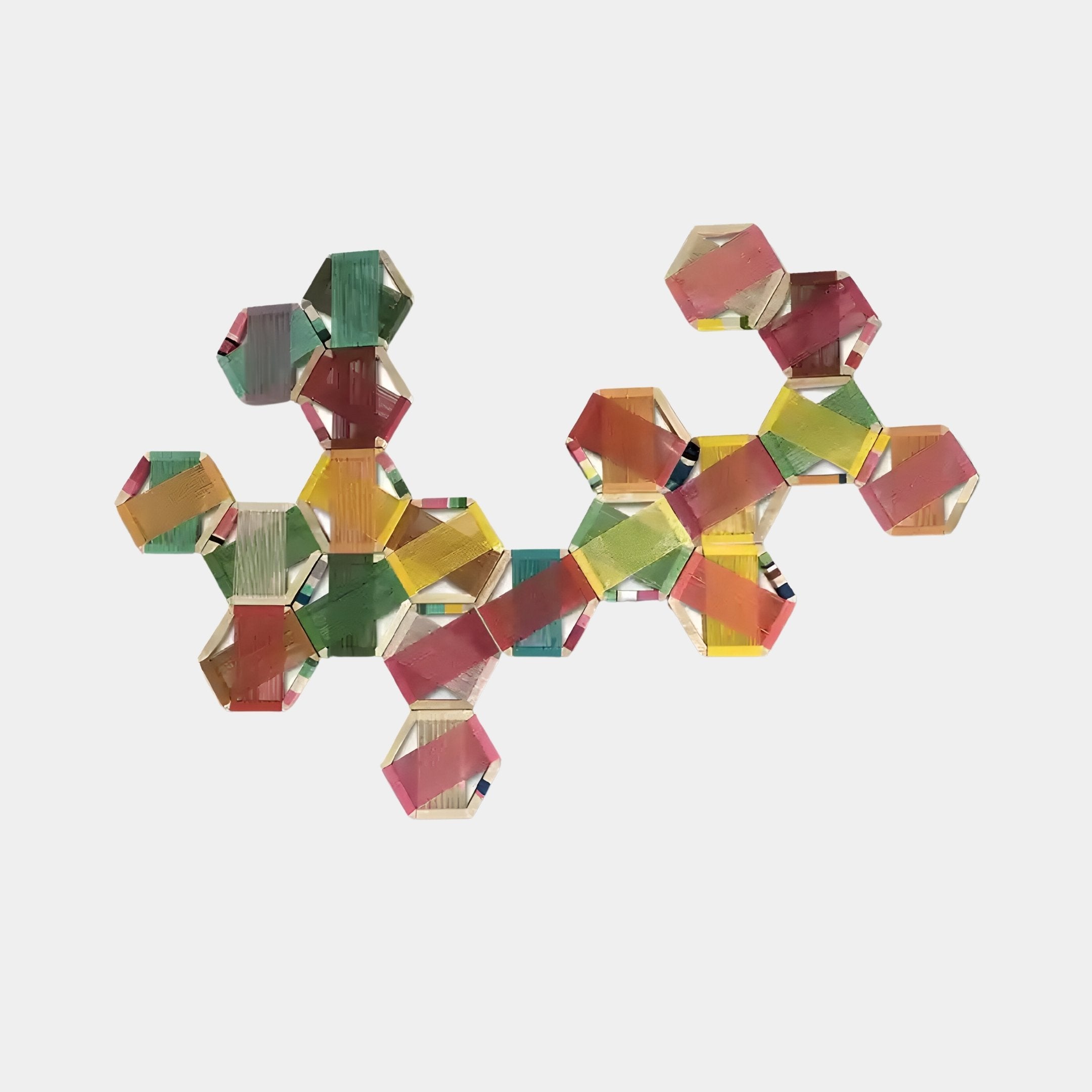 The Spectra V Multicoloured Interwoven Hexagonal Frame 3D Wall Art by Giant Sculptures features a striking geometric design of interconnected hexagons in transparent pink, yellow, green, and orange. It adds vibrant charm to modern interiors against a plain white background.