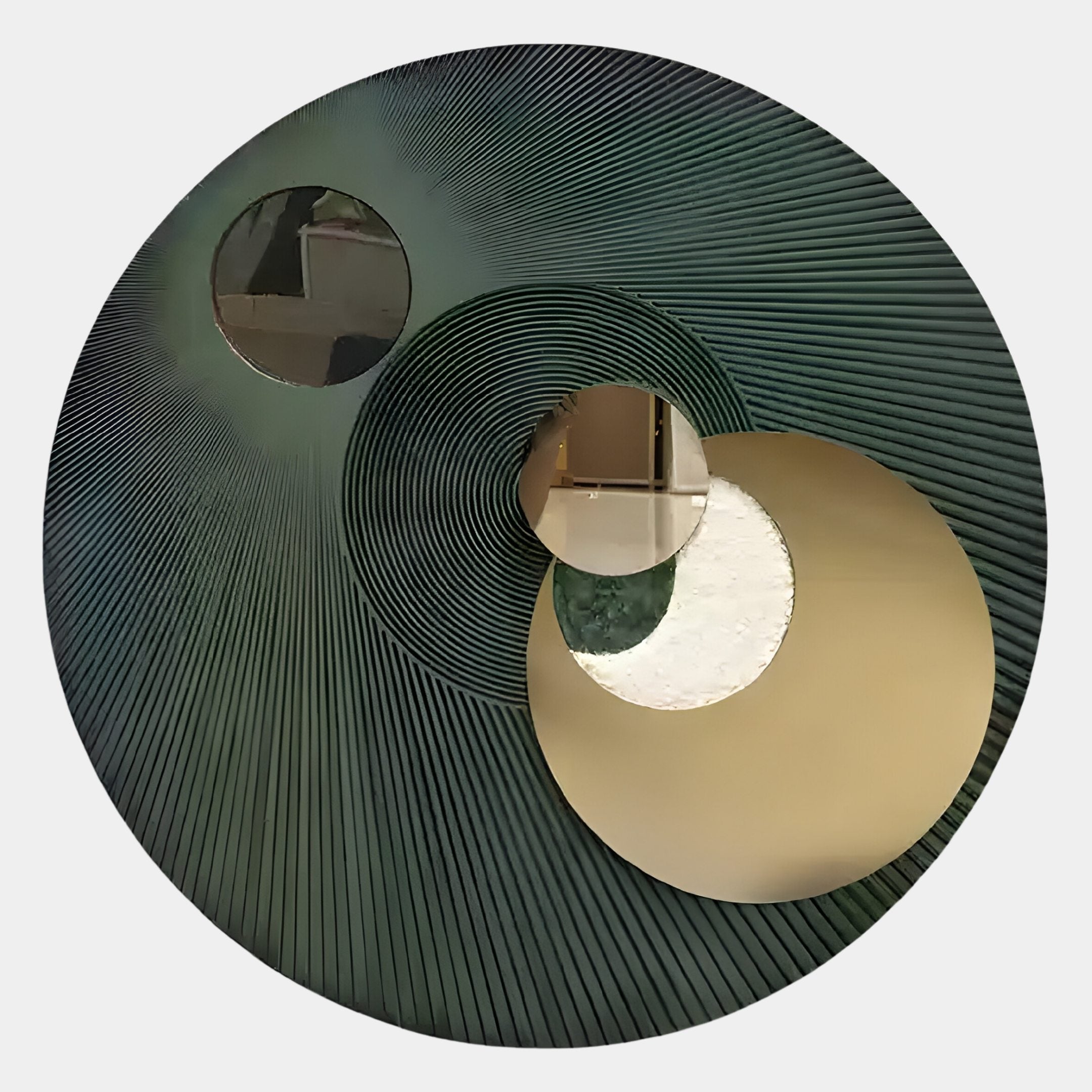 The Orbitra Green Reflective Circular 3D Wall Art by Giant Sculptures features radial lines and three overlapping mirrors, adding dimension and style while reflecting parts of your room.
